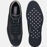 Dark blue leather sneakers by Bugatti, showing the sole and interior, with a textured pattern on the uppers.