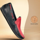 bugatti Chesley dark blue leather slip-on shoe with red accents, shown at an angle.
