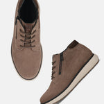Taupe leather sneakers by bugatti with brown laces, a black zipper and white soles.