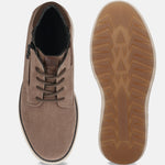 Taupe premium leather comfort sneakers by bugatti, with brown patterned laces and rubber soles.