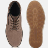 Taupe premium leather comfort sneakers by bugatti, with brown patterned laces and rubber soles.