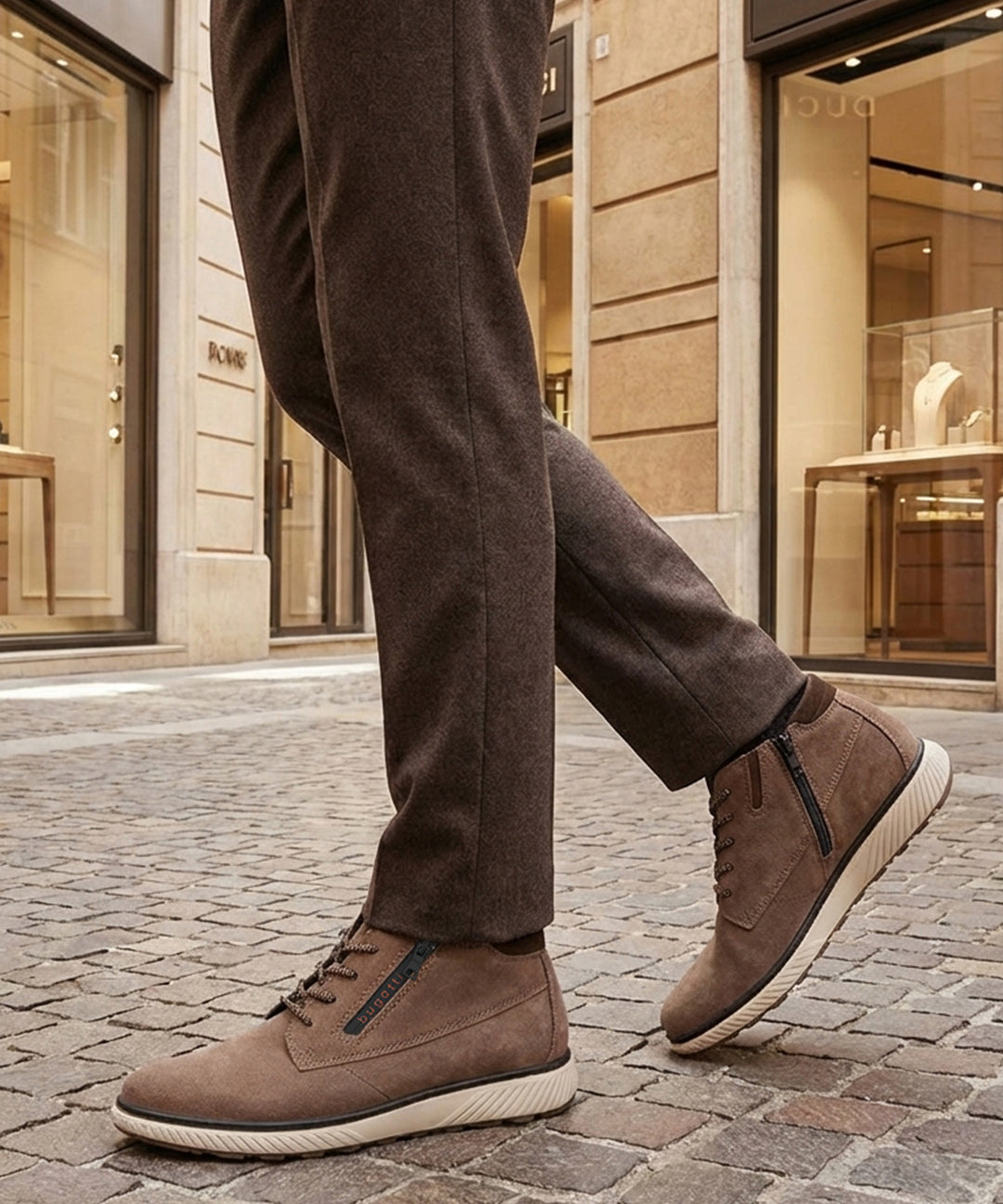 Lifestyle shot of bugatti Pramo Taupe premium leather comfort sneakers with zipper detail.
