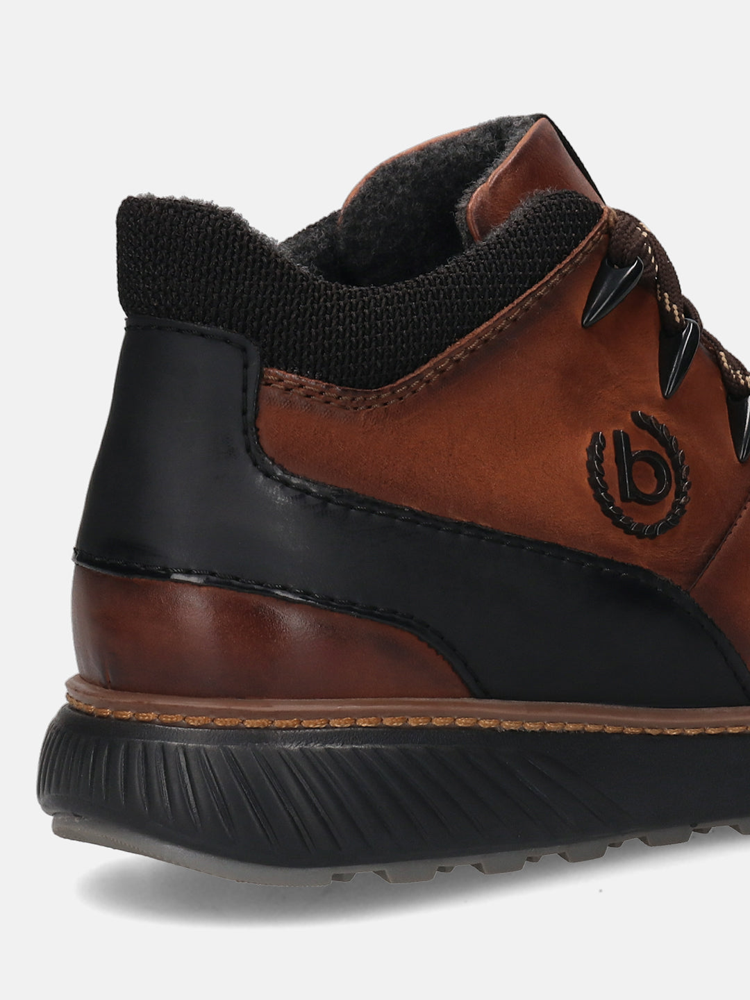 A brown Men's bugatti Sneakers featuring a round toe plain toe, zero heels heel, and a wide fit. Made from premium genuine leather with a durable tpr outsole, this zipper design offers both style and comfort.