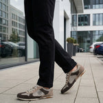 A brown Men's bugatti Sneakers featuring a round plain toe, zero heels heel. Made from suede leather with a durable sebs (block copolymer) outsole, this laces design offers both style and comfort. 