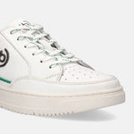 White leather sneaker by bugatti with green accents and white and green laces.