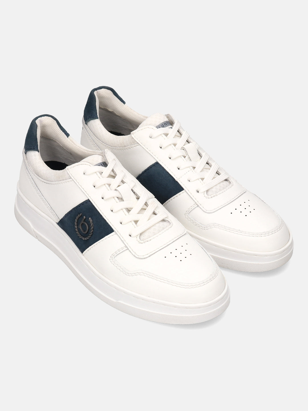 Off-white leather sneakers by bugatti with a navy stripe, white laces, and perforated toe.