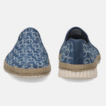 Blue denim slip-on shoes by bugatti, with a circular pattern, jute trim, and ridged white soles.
