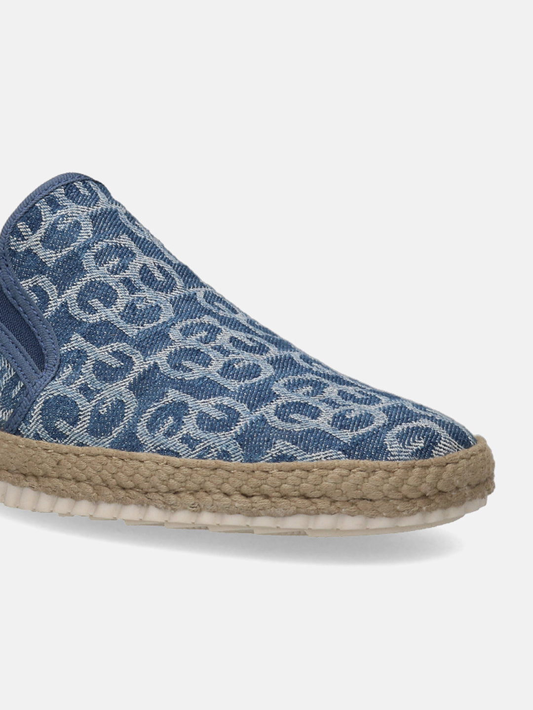 Blue slip-on shoe by bugatti, with a patterned denim upper and woven midsole.