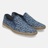 Blue denim comfort slip-ons by bugatti featuring an all-over geometric pattern, jute trim, and white soles.