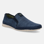 Blue casual slip-on shoes by bugatti with a mesh texture and dark blue suede accents.