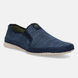 Blue casual slip-on shoes by bugatti with a mesh texture and dark blue suede accents.