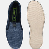 Blue textile slip-on shoe by bugatti with textured sole, shown with the sole facing up.