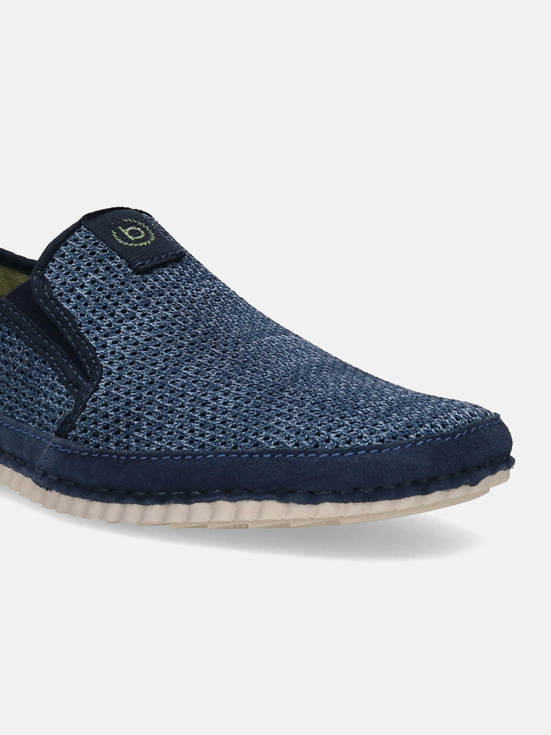 Blue comfort slip-on shoes by bugatti featuring a patterned mesh texture and a contrasting navy trim.