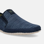 Blue comfort slip-on shoes by bugatti featuring a patterned mesh texture and a contrasting navy trim.