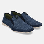Blue comfort slip-on shoe by Bugatti, featuring a textured mesh upper and a contrasting sole.

