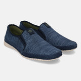 Blue comfort slip-on shoe by Bugatti, featuring a textured mesh upper and a contrasting sole.
