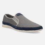 Light grey casual slip-on shoes by bugatti with a textured finish and dark blue accent trim.