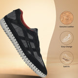 Side view of a black bugatti Baloo sneaker featuring a leather and mesh upper and a white ridged sole.