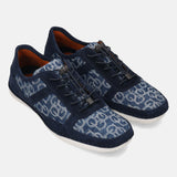 bugatti Bimini Comfort Sneakers in light blue patterned denim with navy suede accents and bungee laces.
