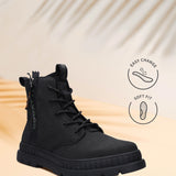 Black bugatti Pallario casual boots with a lace-up closure, lug sole, and a textile upper.