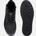 Black bugatti Pallario comfort casual boots, with laces and a side zipper, shown with the sole facing up.
