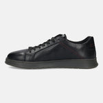 Black leather sneaker by bugatti with red stitch detail and a grey sole, shown in a side view.