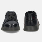 Black leather sneakers by Bugatti with dark laces and red stitching detail on the heel.