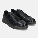 Black leather comfort sneakers by bugatti with dark laces and a side zipper.