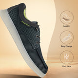 Black comfort sneaker by Bugatti, featuring a textured woven upper and grey suede heel detail.