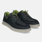 Black comfort sneakers by Bugatti, with a textured pattern, gray trim, and neon green accents.
