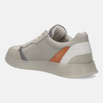 Grey comfort sneakers by bugatti with suede and mesh paneling, and a thick, semi-transparent sole.
