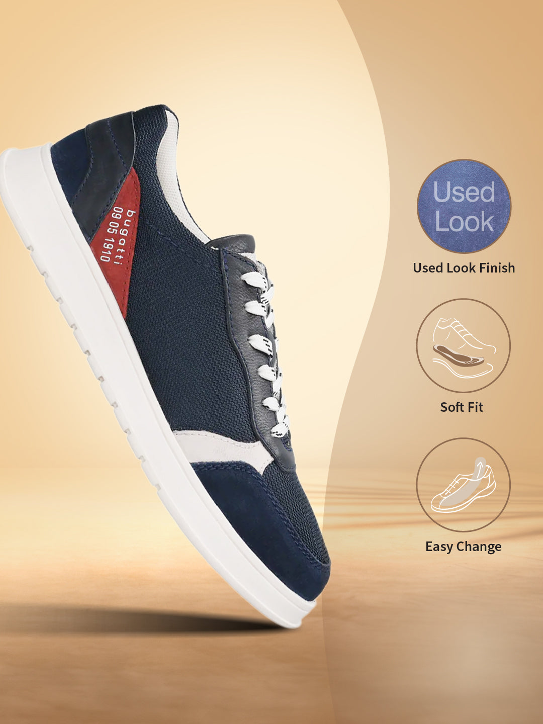 Dark blue comfort sneakers by bugatti with white laces and sole, along with red and white accents.