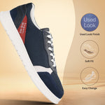 Dark blue comfort sneakers by bugatti with white laces and sole, along with red and white accents.