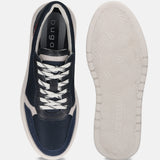 Dark blue sneaker by bugatti, showing uppers and soles with textured patterns and white laces.