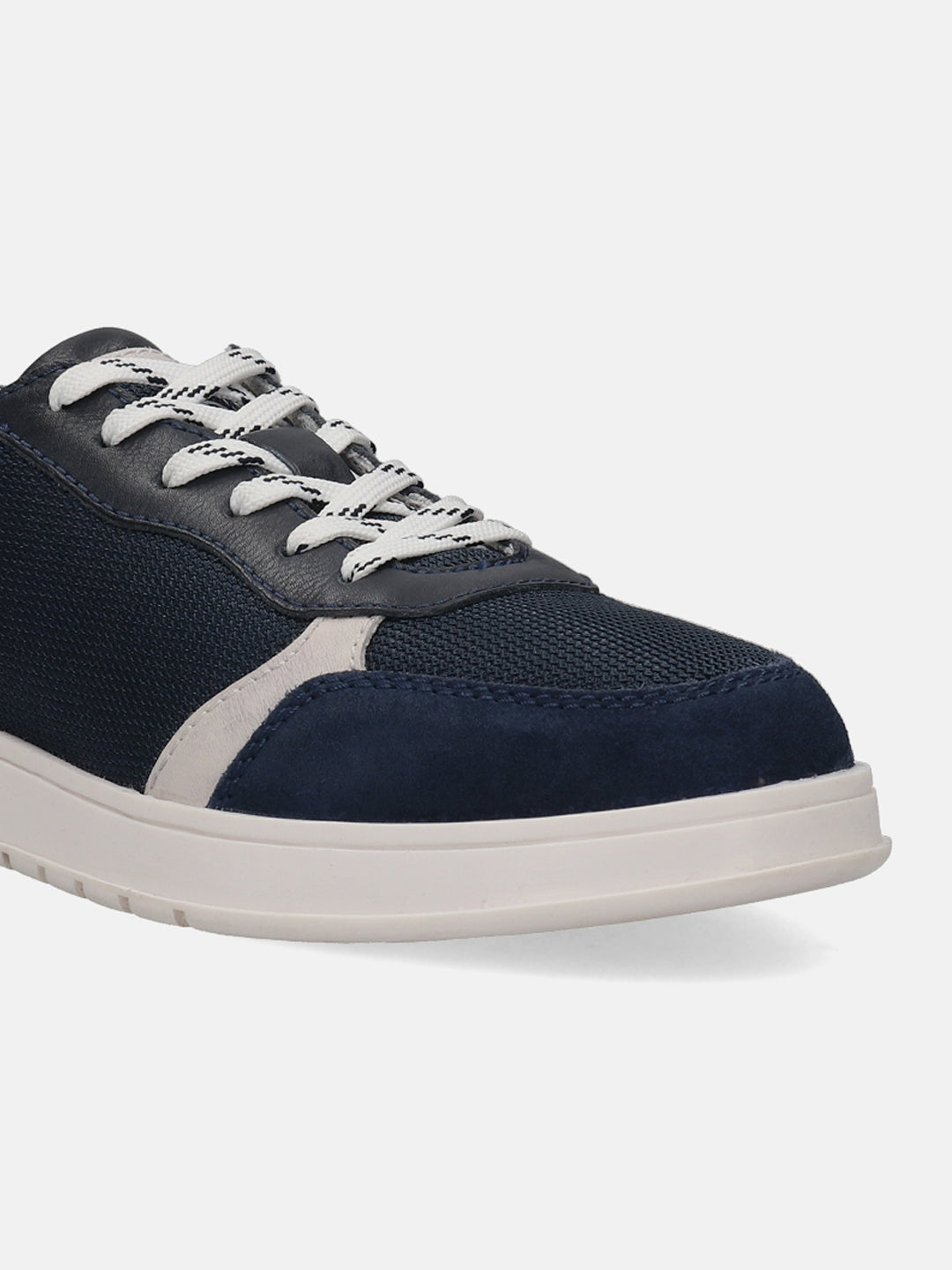 Dark blue comfort sneaker by bugatti featuring white and black patterned laces.