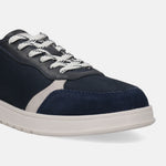 Dark blue comfort sneaker by bugatti featuring white and black patterned laces.