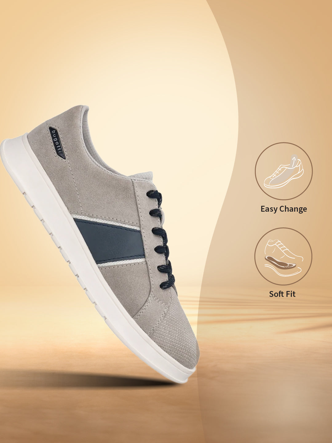 Grey premium leather sneakers by bugatti with navy blue accents, white soles, and black laces.