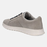 Grey leather sneakers by bugatti with dark laces and a white sole, shown in a side view.