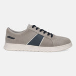 Gray suede sneaker by Bugatti, with navy and silver accent stripe and black laces, shown in a side view.
