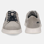Gray leather sneakers by bugatti with navy blue laces, shown in a front and rear view.