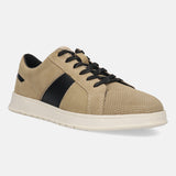 Beige leather sneakers by bugatti with black accents, black laces, and a flat white sole.