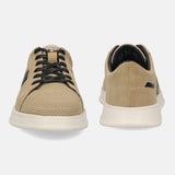 Beige premium leather sneakers by bugatti, with black laces and a white rubber sole.