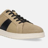 Beige leather sneakers by bugatti, with black side stripe, perforated toe, and black laces.