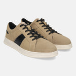 Beige leather sneakers by Bugatti with a black side stripe and black laces.
