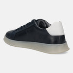 Dark blue leather sneaker by bugatti with a white heel detail and translucent sole, shown in a three-quarter view.