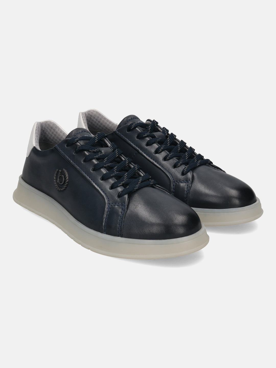 Dark blue leather sneakers by Bugatti, with a light gray rubber sole and dark blue laces.