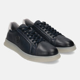 Dark blue leather sneakers by Bugatti, with a light gray rubber sole and dark blue laces.
