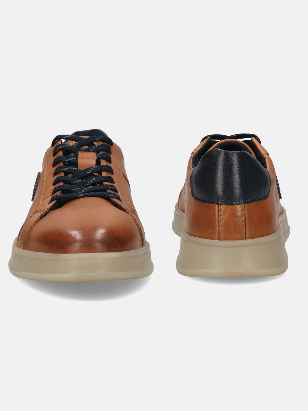 Cognac leather sneakers by bugatti with black laces and heel counter, set on a tan rubber sole.
