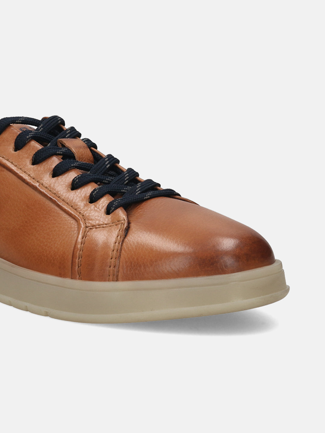 Cognac leather sneakers by bugatti, featuring dark laces and a contrasting light tan sole.