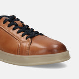 Cognac leather sneakers by bugatti, featuring dark laces and a contrasting light tan sole.
